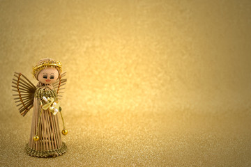 Christmas angel stock images. Christmas angel on a golden background. Golden holiday background....