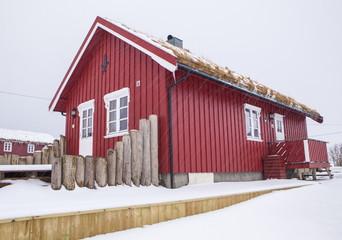 Traditional red house in Norway, the Lofoten Islands in winter