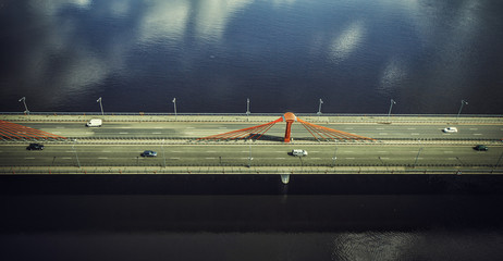 Bridge with cars dslr Drone from above blue sky and river
