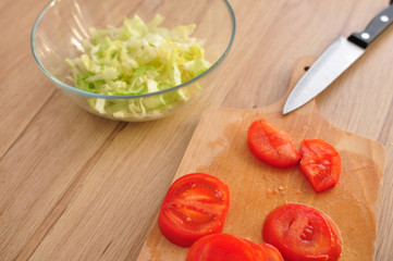 Sliced tomatoes and cabbage for salad