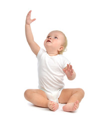Infant child baby toddler sitting hands up 