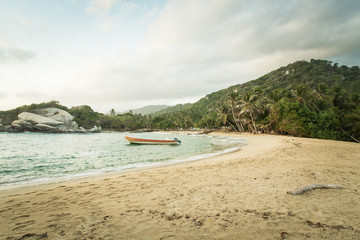 Fototapeta na wymiar Boat in caribbean beach