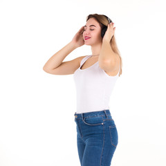 Young cute girl listens music, isolated  