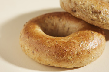 Fototapeta na wymiar two whole wheat bagels