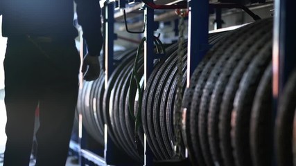 Worker choosing a tire in the warehouse