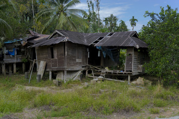 Fototapeta na wymiar Old deserted wooden village house.