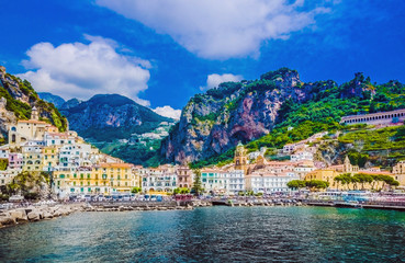 Scenic picture-postcard view of the beautiful town of Amalfi at famous Amalfi Coast with Gulf of...