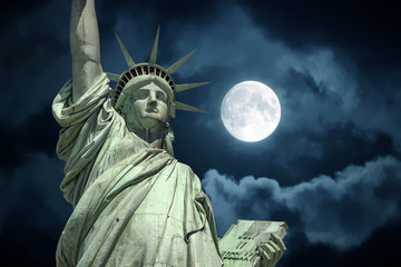 Statue of liberty in New York on full moon sky