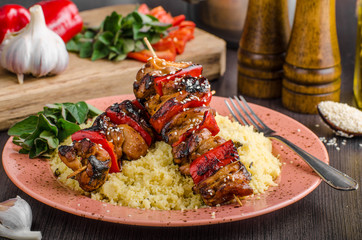 Chicken skewers say sauce