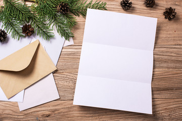 letter and envelopes on a wooden table and tree, bumps. Mock-up letter format A4