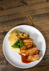 Fried pork chop, mashed potato and vegetable salad in plate on a wooden background. with copy space. top view