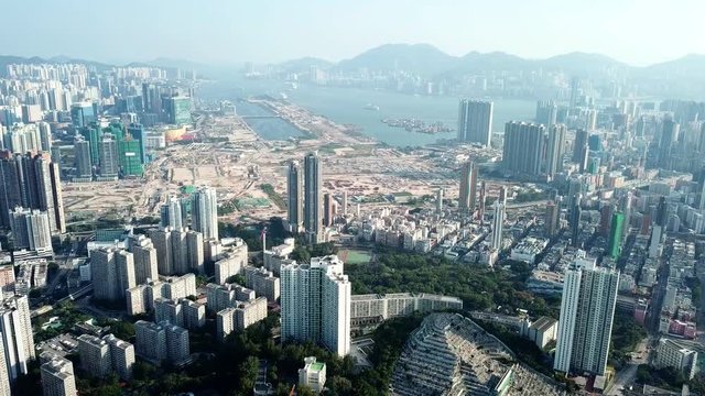 Flying over Hong Kong cityscape