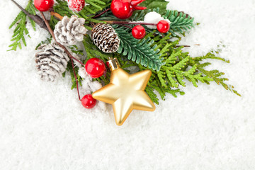Fototapeta na wymiar Christmas Border with Xmas Decor, Green Fir Twig and Glass Balls on White Snow Background