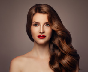 Young Woman with Long Healthy Wavy Hairstyle. Girl with Colored Hair, Haircare Concept