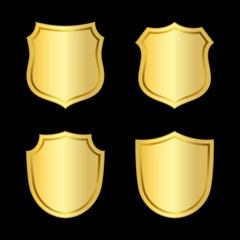Gold shield shape icons set. 3D golden emblem signs isolated on black background. Symbol of security, power, protection. Badge shape shield graphic design Vector illustration