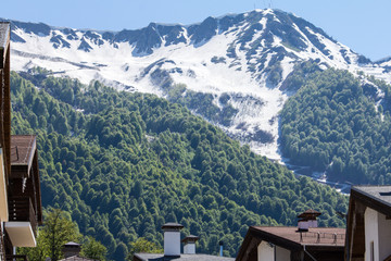 Fototapeta na wymiar snow-capped mountain peaks against the blue sky