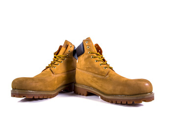 Pair of brown hiking boots isolate on a white background