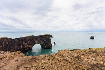Fototapeta premium volcanic arch on Dyrholaey promontory in Iceland