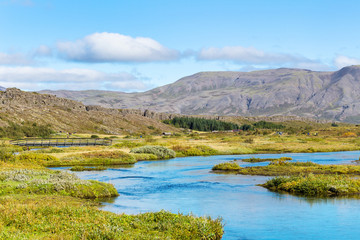 Fototapeta premium Oxara river in Thingvellir national park in autumn