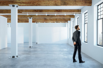 Fototapeta premium Man in empty room