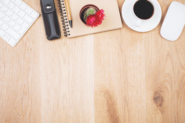 Wooden workspace with various items