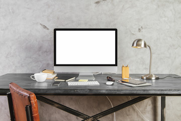 Table with empty white computer screen front