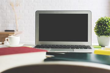 Fototapeta premium Stylish workplace with empty laptop screen