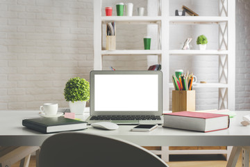 Desktop with white laptop screen