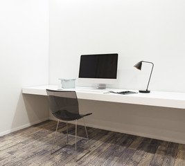 Workplace with empty computer in modern interior