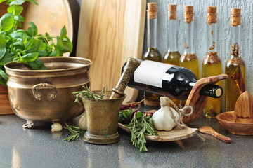 Kitchen utensils with bottles.