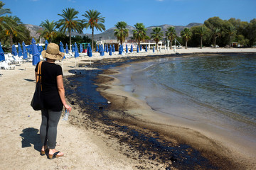 Athens, Greece, September 14 2017: Greek oil spill spreads to Athens Riviera following the sinking...