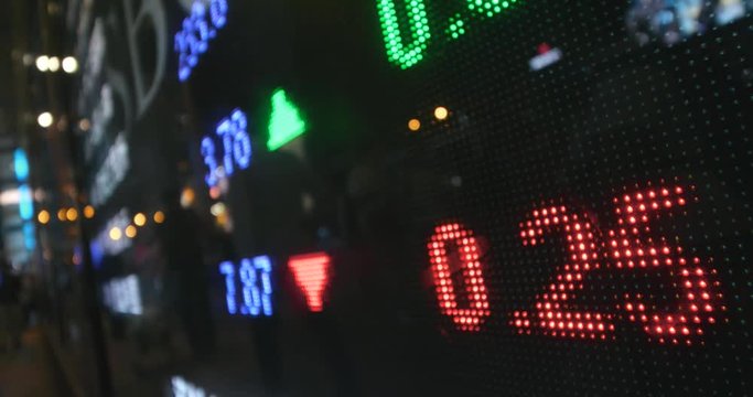 Stock market screen display at night