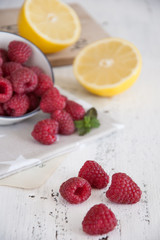 Fresh raspberries and lemon