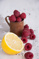 Fresh raspberries and lemon