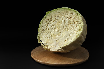 Cabbage cut in half on a dart board