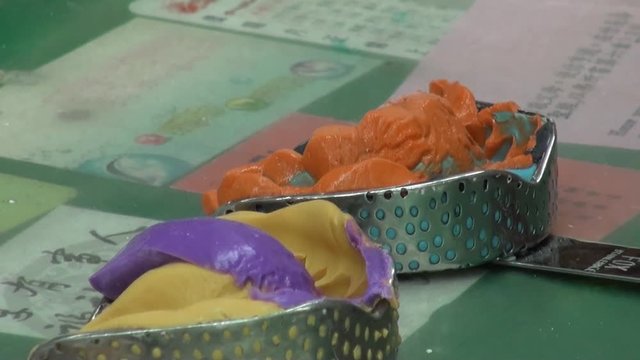 Dental molds placed on a workshop table. Dental prosthesis laboratory.