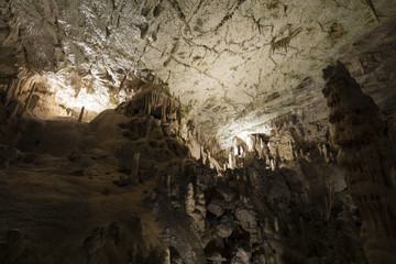 World famous cave Postojna in Slovenia with stalactites and stalagmites