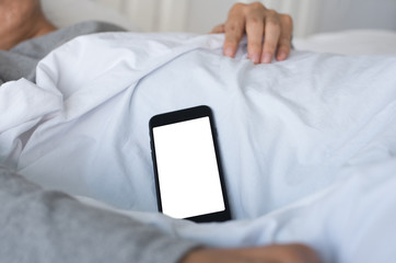 Smartphone on bed