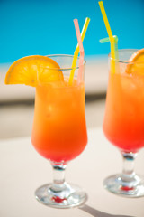Cocktails on the background of the pool