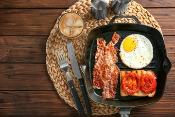 Composition with traditional English breakfast on table