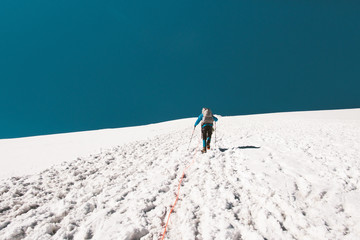 Man climbing in mountains glacier Travel Lifestyle endurance concept adventure active vacations...