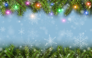 Fototapeta na wymiar Christmas background green fir tree branches and snow