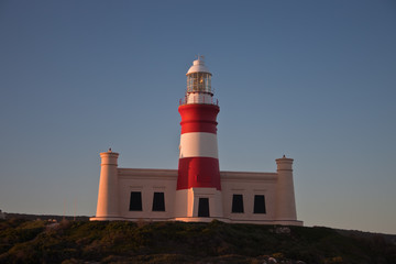 Fototapeta na wymiar Lighthouse at the southernmost point of Africa