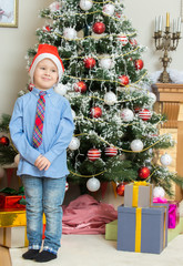 Little boy with Christmas Tree