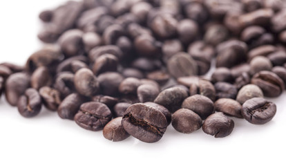 roasted coffee beans isolated in white background