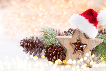 Christmas background. Christmas star and santa hat. Greeting card.