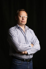 Obraz premium White Man in glasses posing in studio