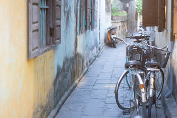 vintage bikes in narrow alley of old town