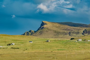 lands between sky and ocean panorama of Scotland in England in summer
