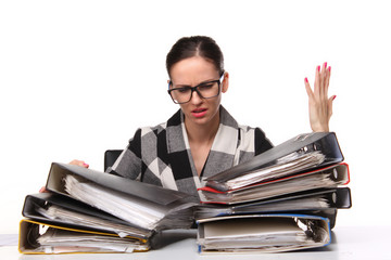 Female office worker  sitting at the desk with papers document. Tired and exhousted business woman.